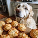 Golden Retriever dog looking longingly at Coconut & Honey Bites – Recipe for Dogs on a wooden board.