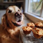 Golden retriever looking at a batch of freshly baked Pumpkin & Apple Bites – Recipe for Dogs cooling on a wire rack.