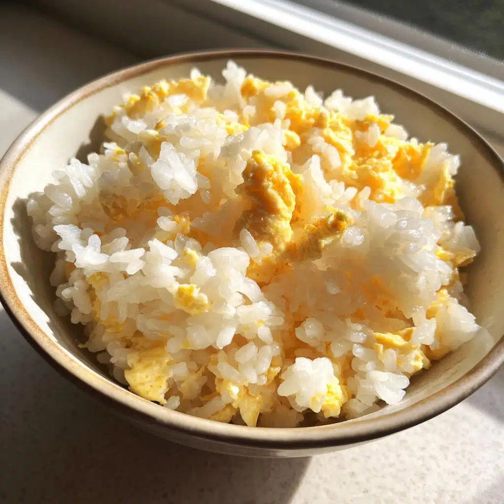 Bowl of Easy Rice & Egg Meal for Tiny Pups, showing cooked rice mixed with scrambled eggs.