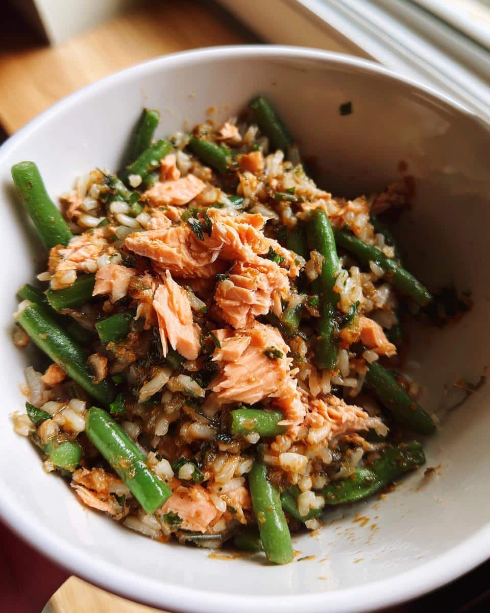 Bowl of Easy Salmon & Green Bean Dog Food, featuring salmon, green beans, and rice.