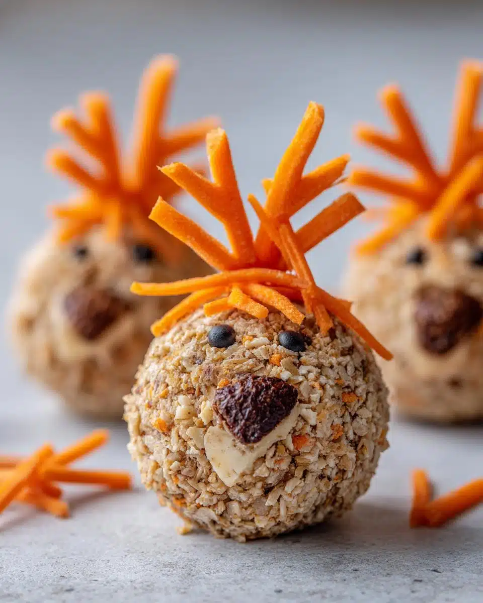 Close-up of a festive Reindeer Cheese Balls for pet treat, decorated with carrot slivers for antlers.